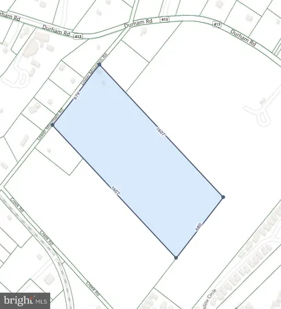 a view of a floor to ceiling window and tree