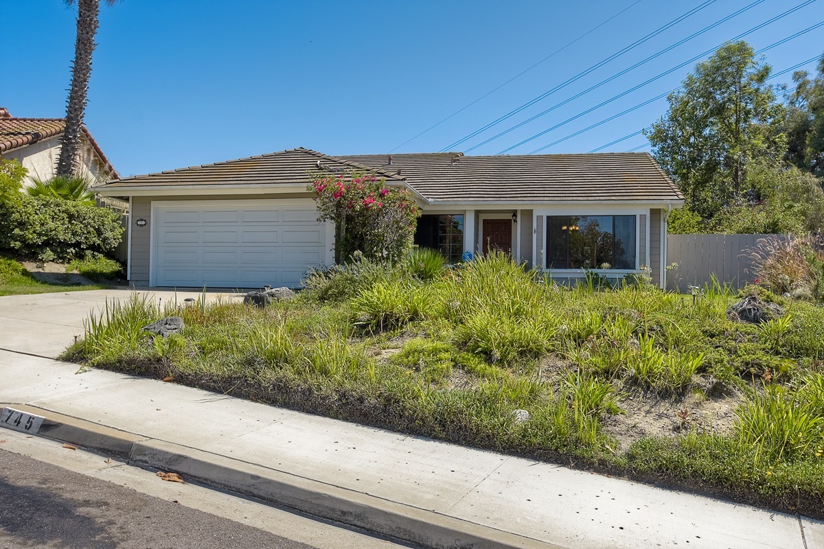 745 Winding Way Encinitas, CA 92024 - Photo 1 of 25 Delightful single story nestled into trees and perched up on hillside to capture breezes...