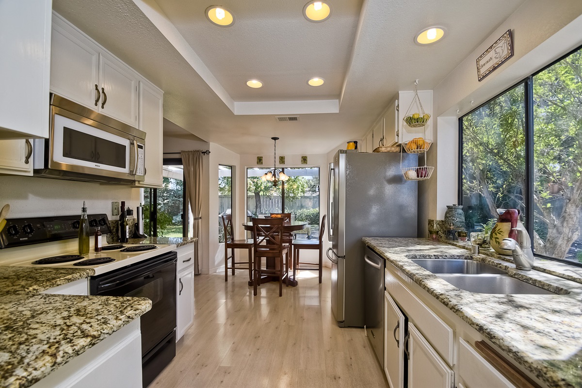 745 Winding Way Encinitas, CA 92024 - Photo 12 of 25 Standing in the dining area and looking back into the kitchen~