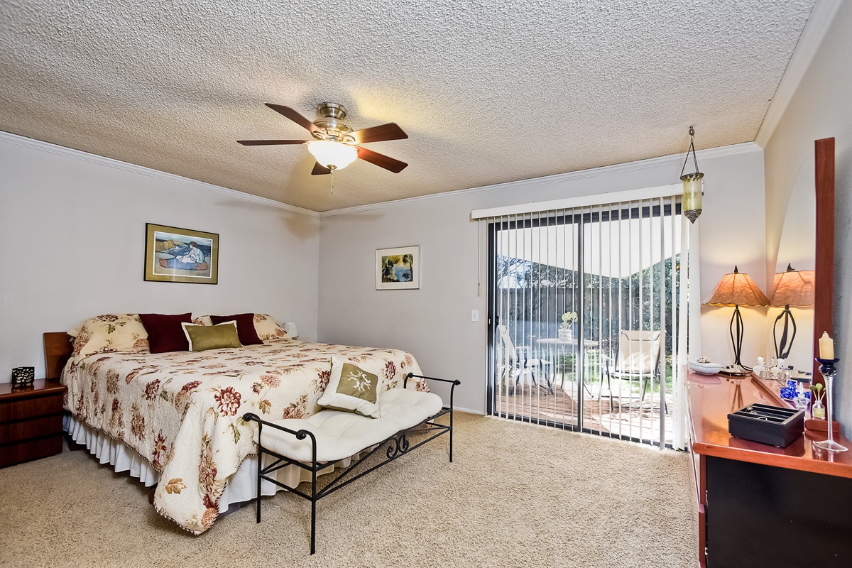 745 Winding Way Encinitas, CA 92024 - Photo 14 of 25 Master bedroom with sliding glass doors to backyard paradise!