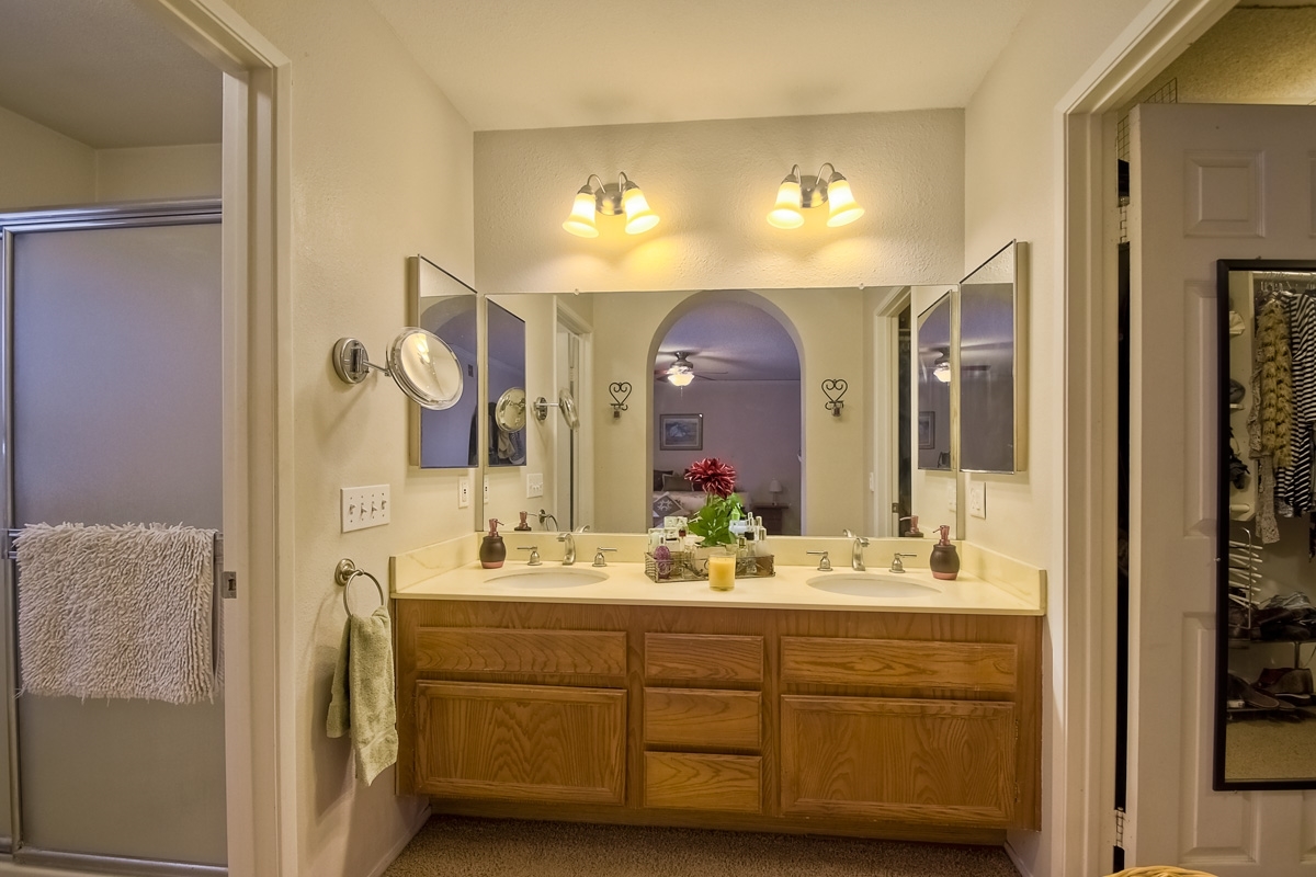745 Winding Way Encinitas, CA 92024 - Photo 15 of 25 Master bath offers separate water closet and a nicely apportioned walk-in closet.