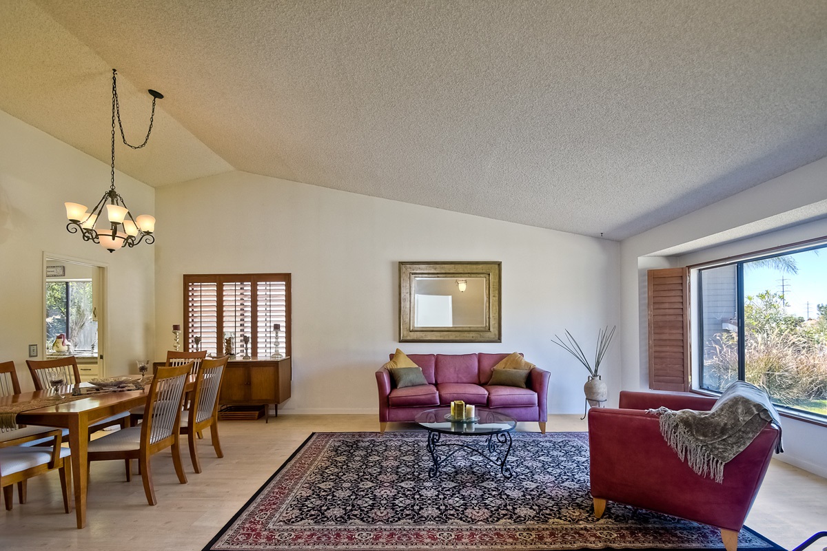 745 Winding Way Encinitas, CA 92024 - Photo 3 of 25 Living room and dining area open to one another~