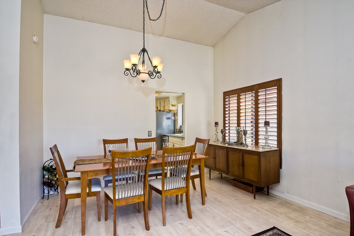 745 Winding Way Encinitas, CA 92024 - Photo 6 of 25 Spacious dining area adjacent to living room. Enhanced by side garden views and an easy pass through into kitchen~