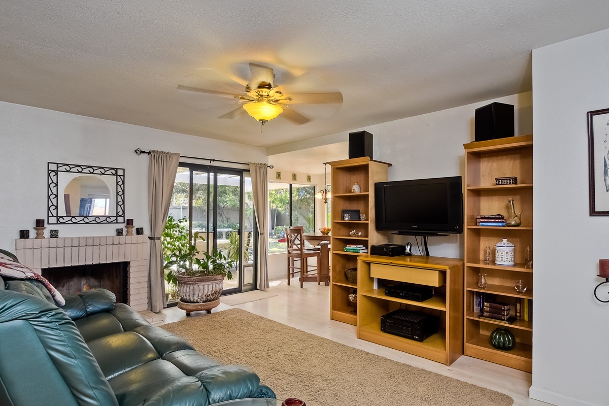745 Winding Way Encinitas, CA 92024 - Photo 7 of 25 Cozy family room with sliding glass doors to your backyard paradise. Opens up nicely to kitchen and breakfast nook!~