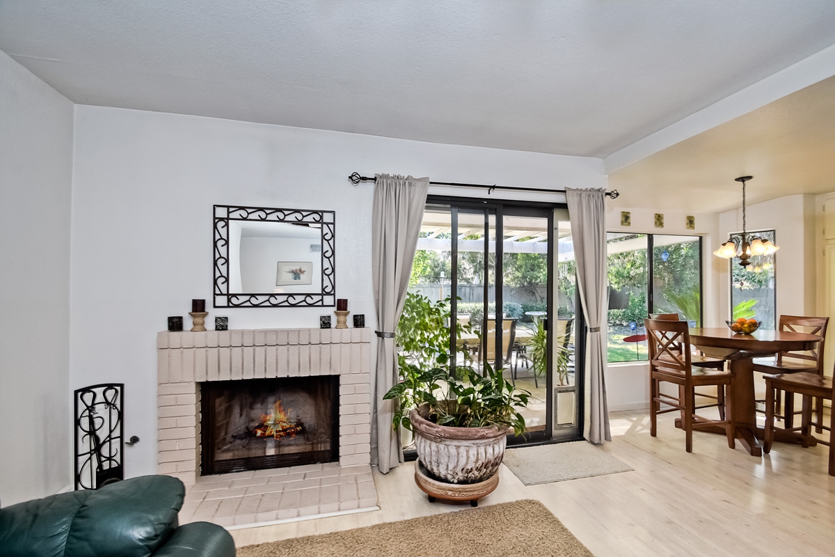 745 Winding Way Encinitas, CA 92024 - Photo 8 of 25 Fireplace adds to family room ambiance for sure!!