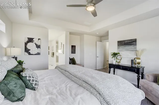 a bathroom with a sink a faucet a mirror and a shower