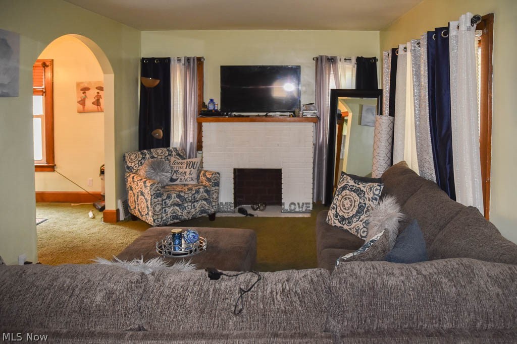 2418 Ada Place Northwest Canton, OH 44708 - Photo 6 of 14 Living room with a fireplace.
