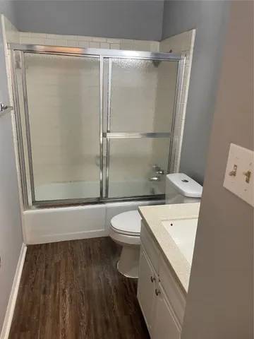 an empty room with a empty space and a window