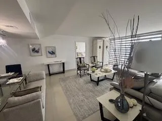 a living room with furniture and a couch