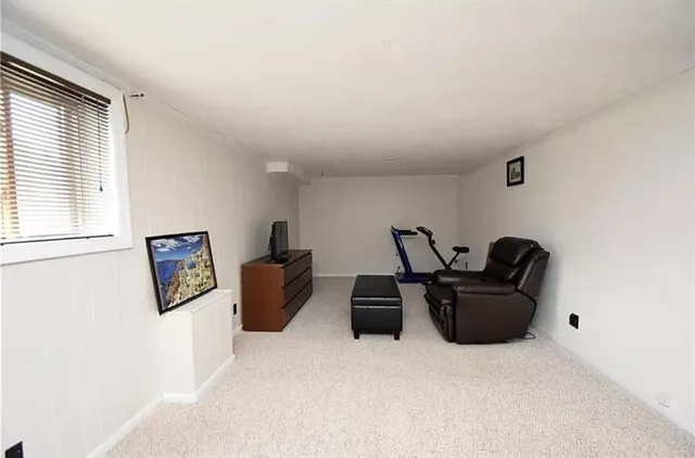 a workspace with furniture and window