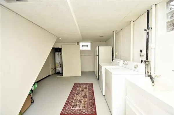 a bathroom with a sink a mirror and a bathtub
