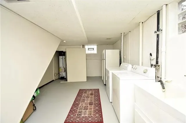 a bathroom with a sink a mirror and a bathtub