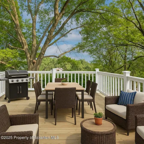 a view of a workspace with furniture