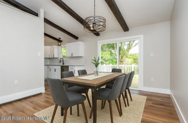 a view of a workspace with furniture