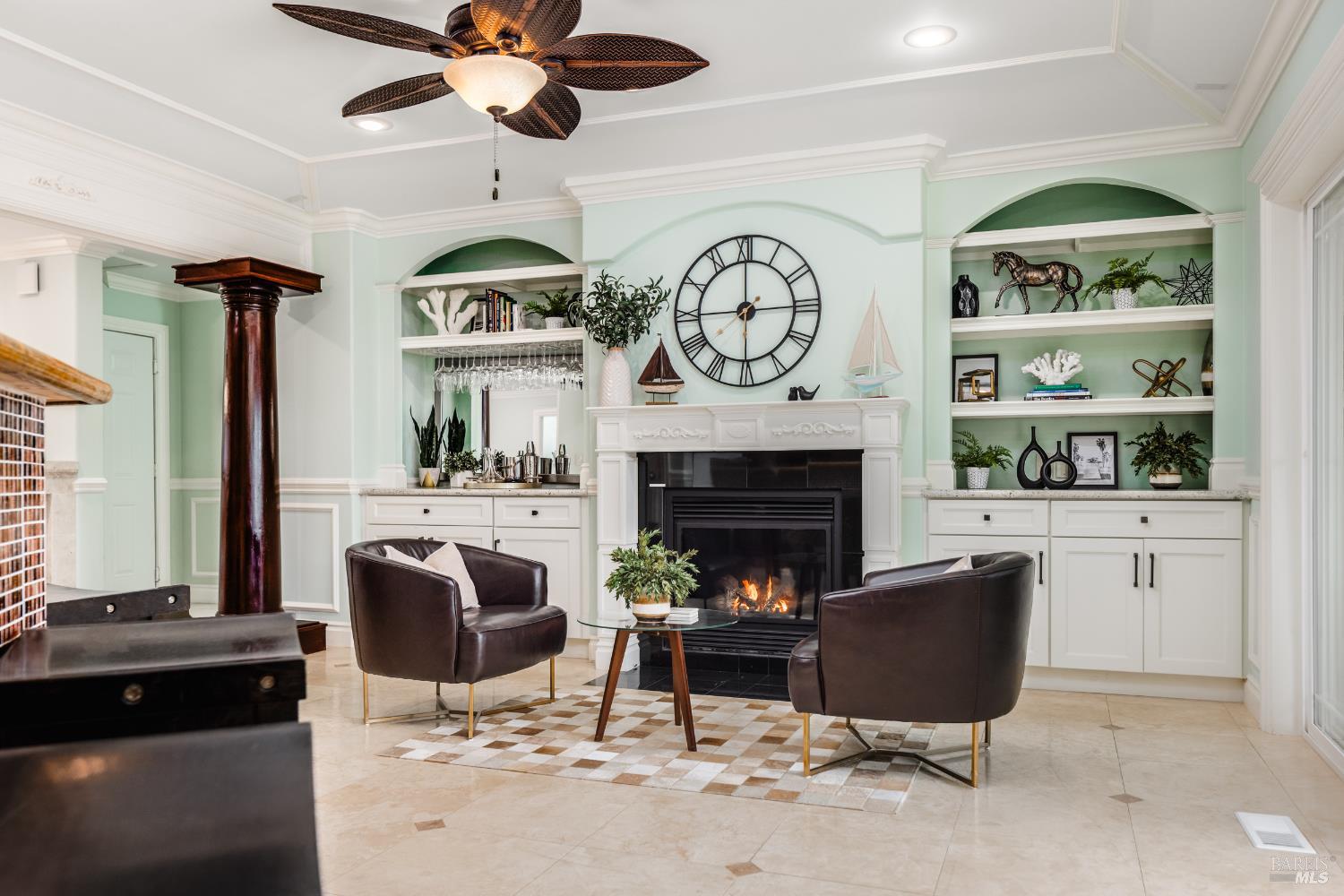 1534 Ranch Road Bodega Bay, CA 94923 - Photo 12 of 33 a living room with furniture a clock and a fireplace
