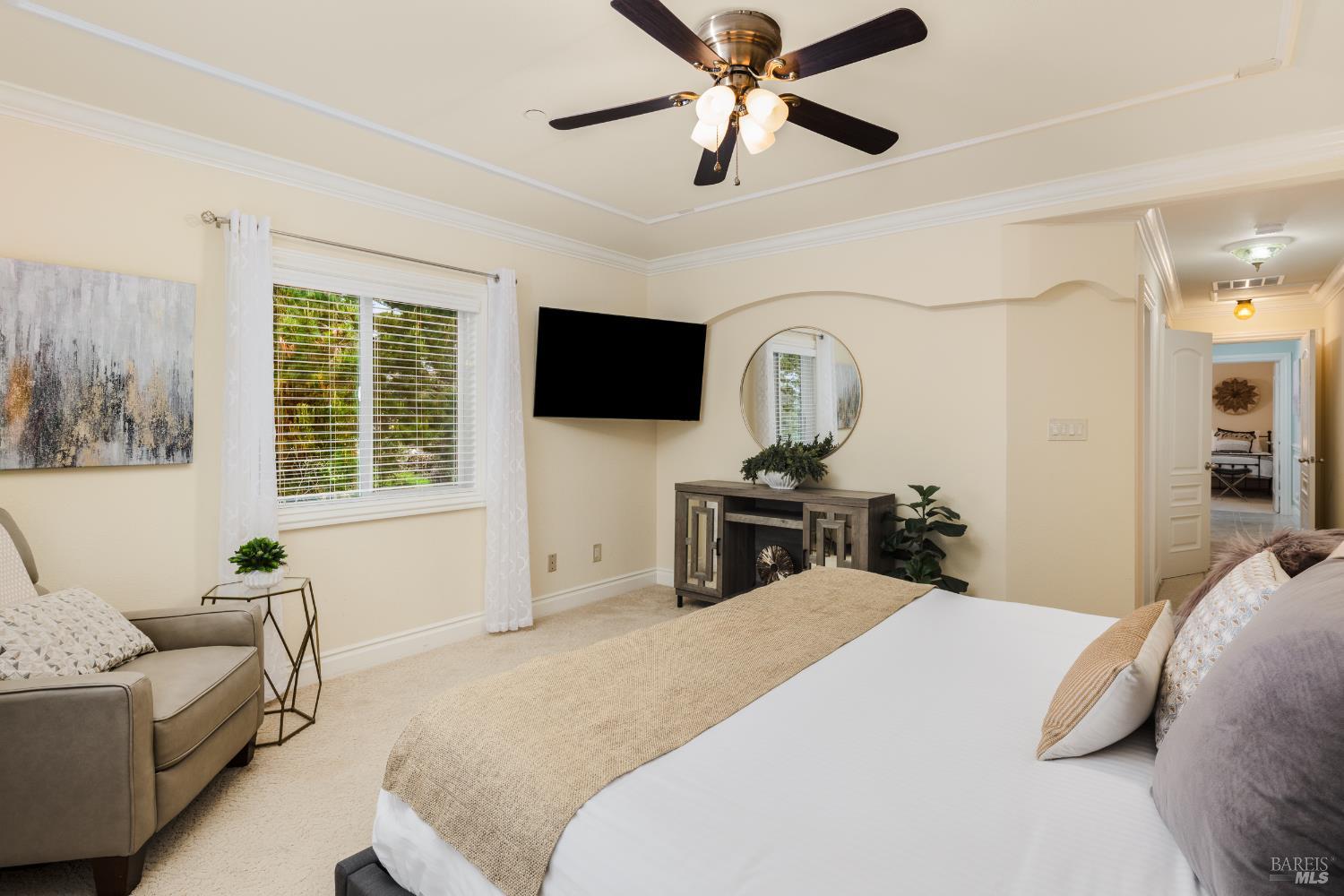 1534 Ranch Road Bodega Bay, CA 94923 - Photo 16 of 33 a bedroom with a bed and a flat screen tv