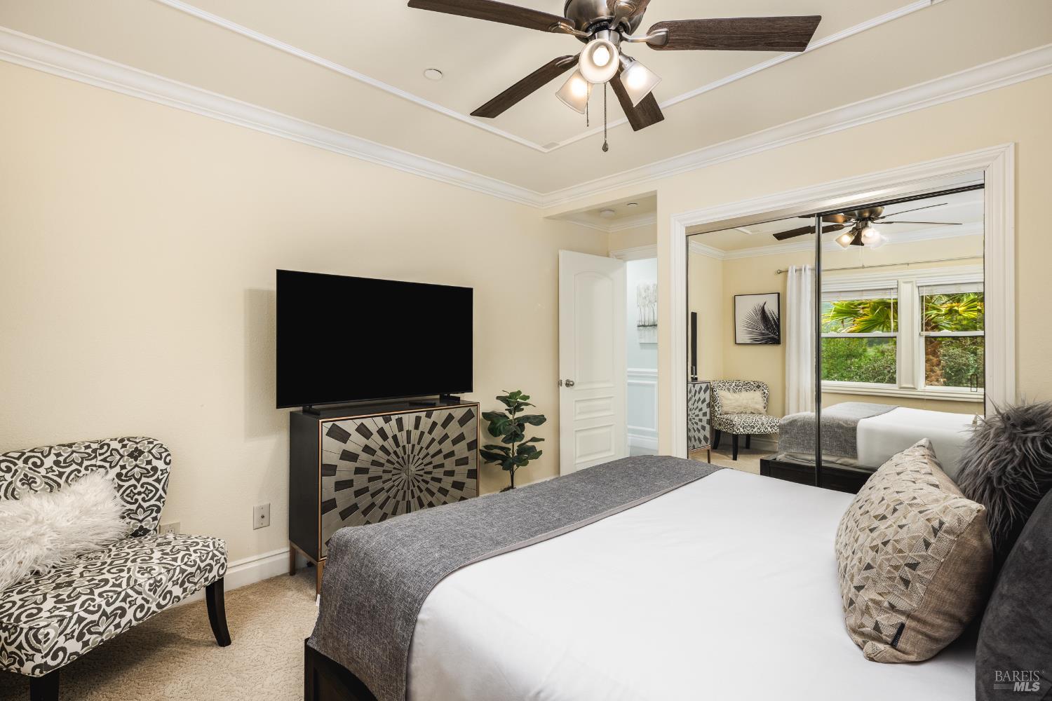 1534 Ranch Road Bodega Bay, CA 94923 - Photo 24 of 33 a bedroom with a bed and a flat screen tv