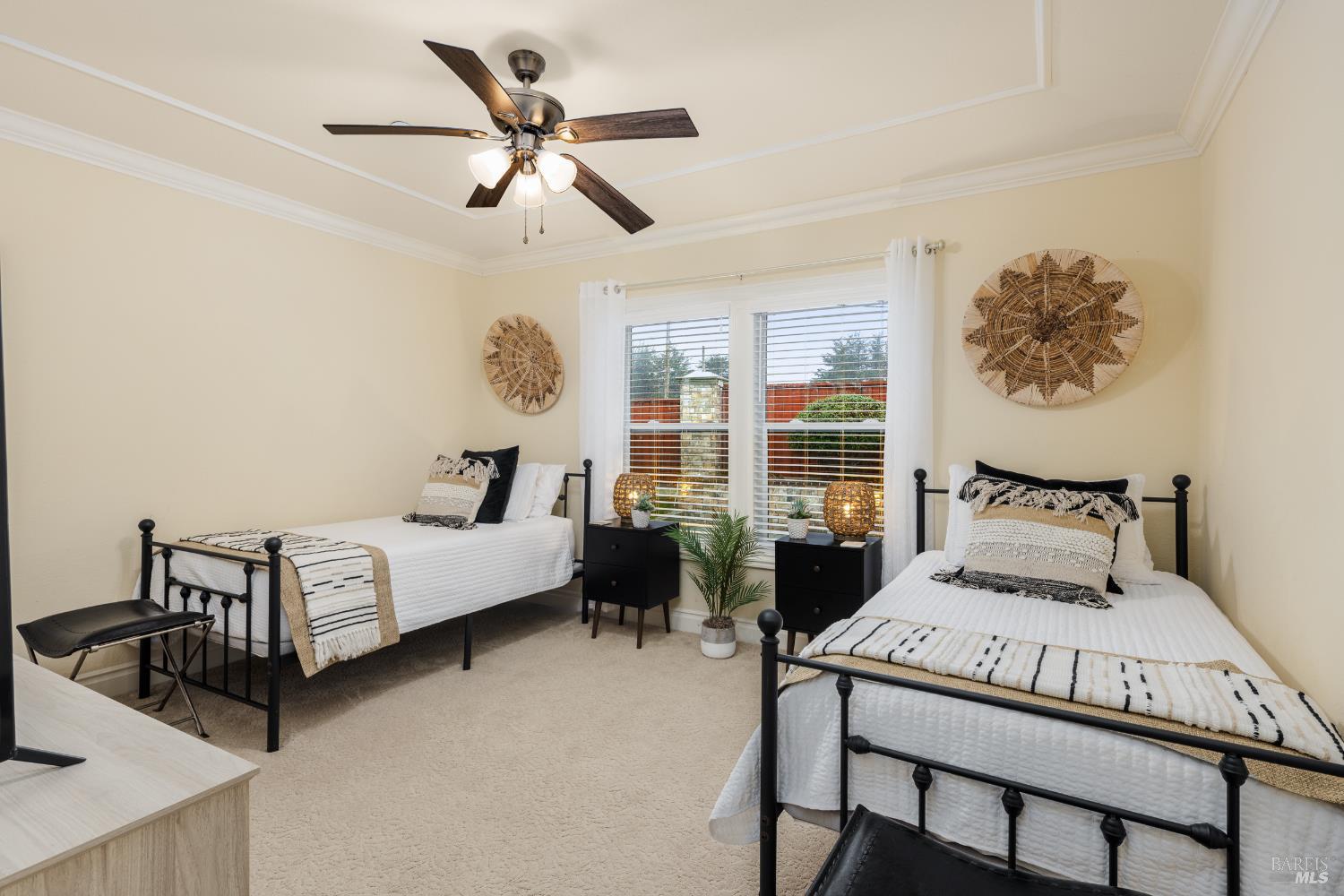 1534 Ranch Road Bodega Bay, CA 94923 - Photo 25 of 33 a bedroom with a bed and a chandelier