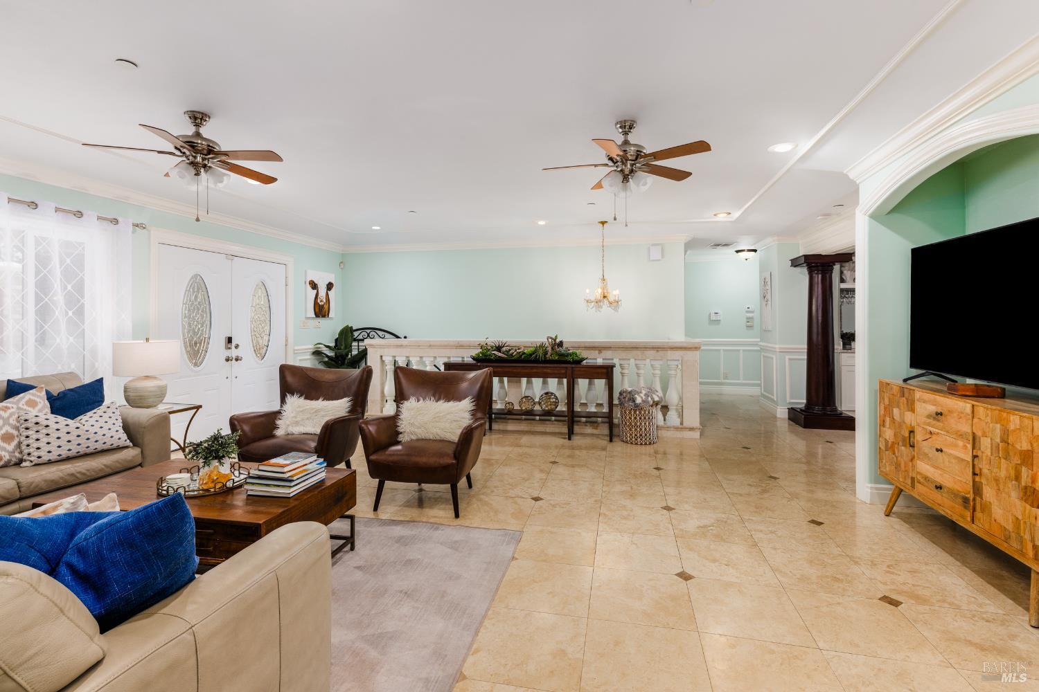 1534 Ranch Road Bodega Bay, CA 94923 - Photo 7 of 33 a living room with furniture and a flat screen tv