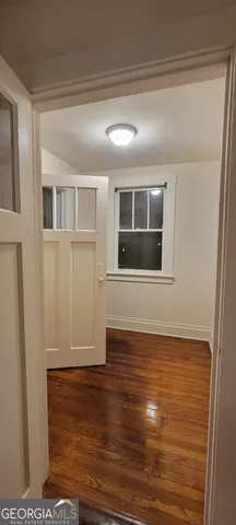 a view of entryway with wooden floor