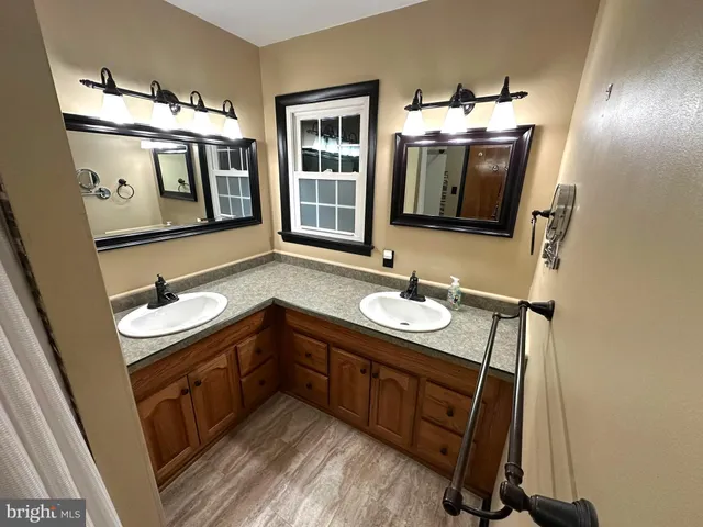 a bedroom with furniture and white walls