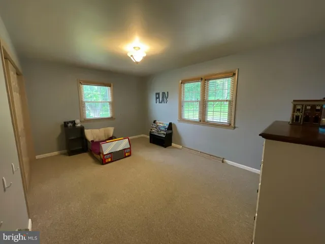 a view of room with furniture