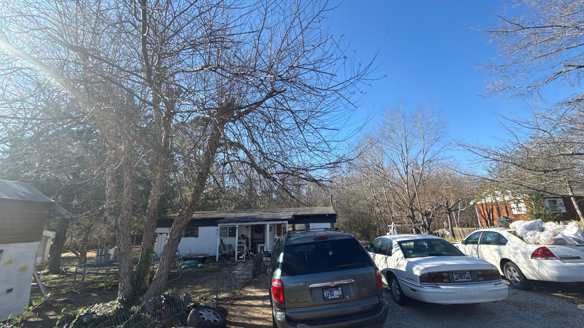 693 Watson Road, Unit SUITE E Jackson, TN 38305 - Photo 12 of 12 a car parked in front of a house