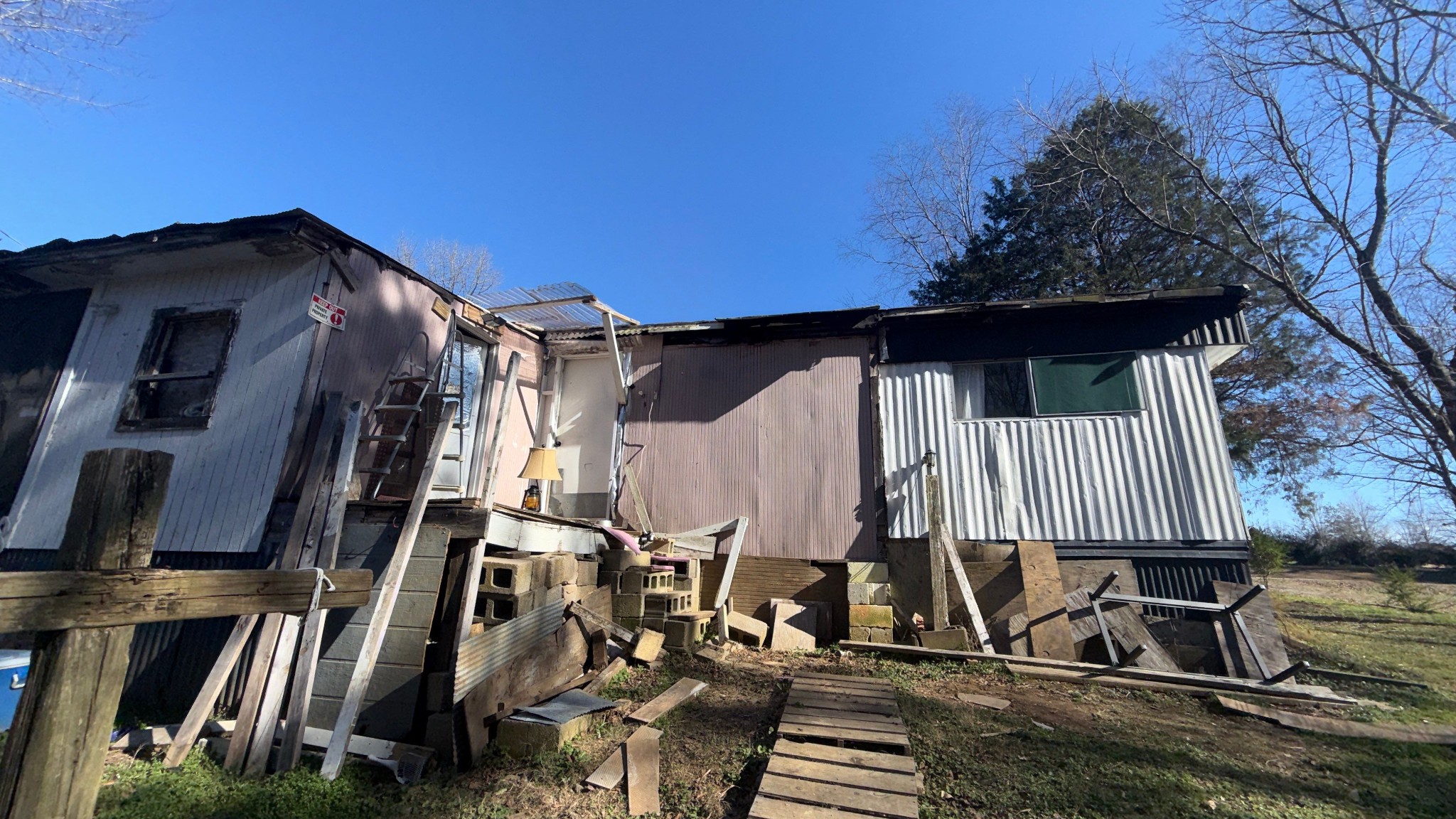 693 Watson Road, Unit SUITE E Jackson, TN 38305 - Photo 4 of 12 a view of walk in closet with clothes and shoes