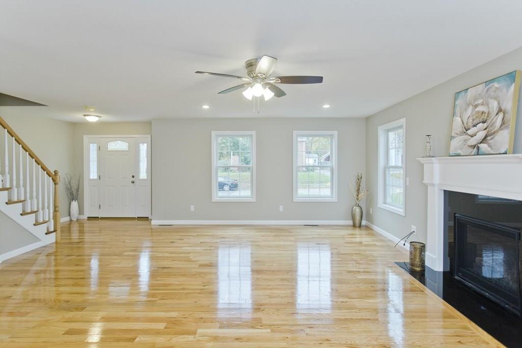 281 Gilbert Avenue Springfield, MA 01119 - Photo 12 of 31 a view of an empty room with window and fireplace