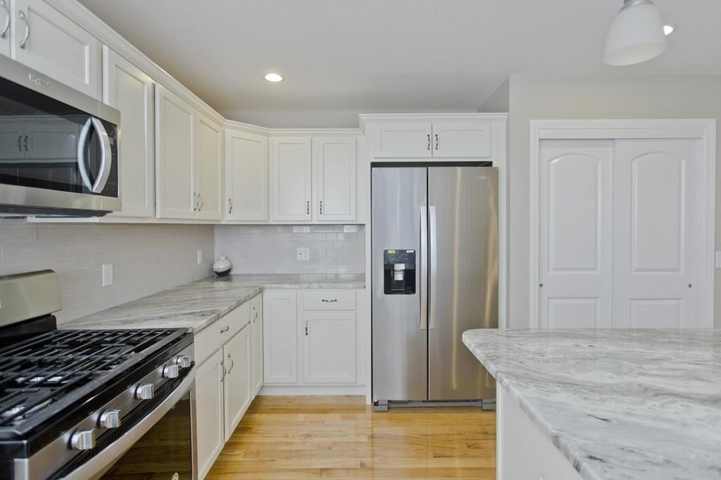 281 Gilbert Avenue Springfield, MA 01119 - Photo 3 of 31 a kitchen with stainless steel appliances granite countertop a refrigerator and a stove top oven