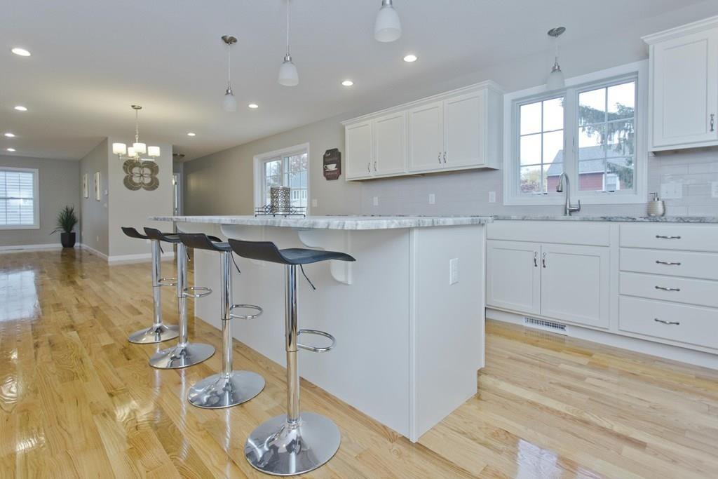 281 Gilbert Avenue Springfield, MA 01119 - Photo 8 of 31 a kitchen with stainless steel appliances granite countertop a sink and cabinets