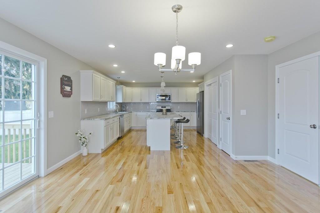 281 Gilbert Avenue Springfield, MA 01119 - Photo 9 of 31 a view of a kitchen and a chandelier