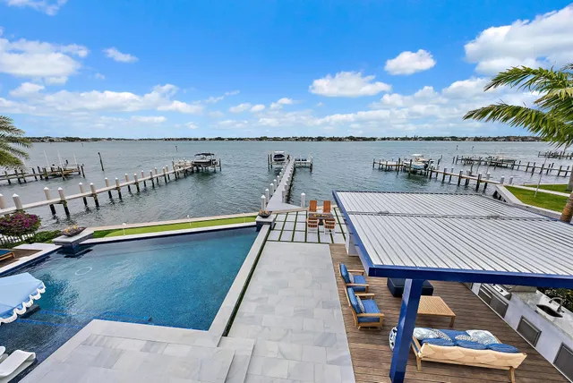 a view of a swimming pool with an ocean view