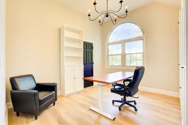 a workspace with chandelier