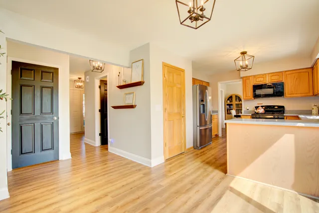 a view of a kitchen from the hallway