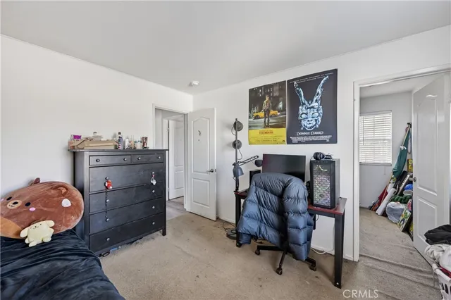 a view of a workspace with furniture