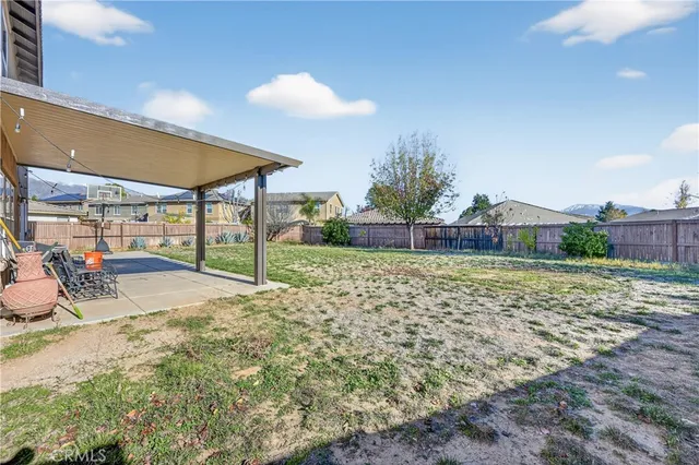 an aerial view of residential houses and outdoor space