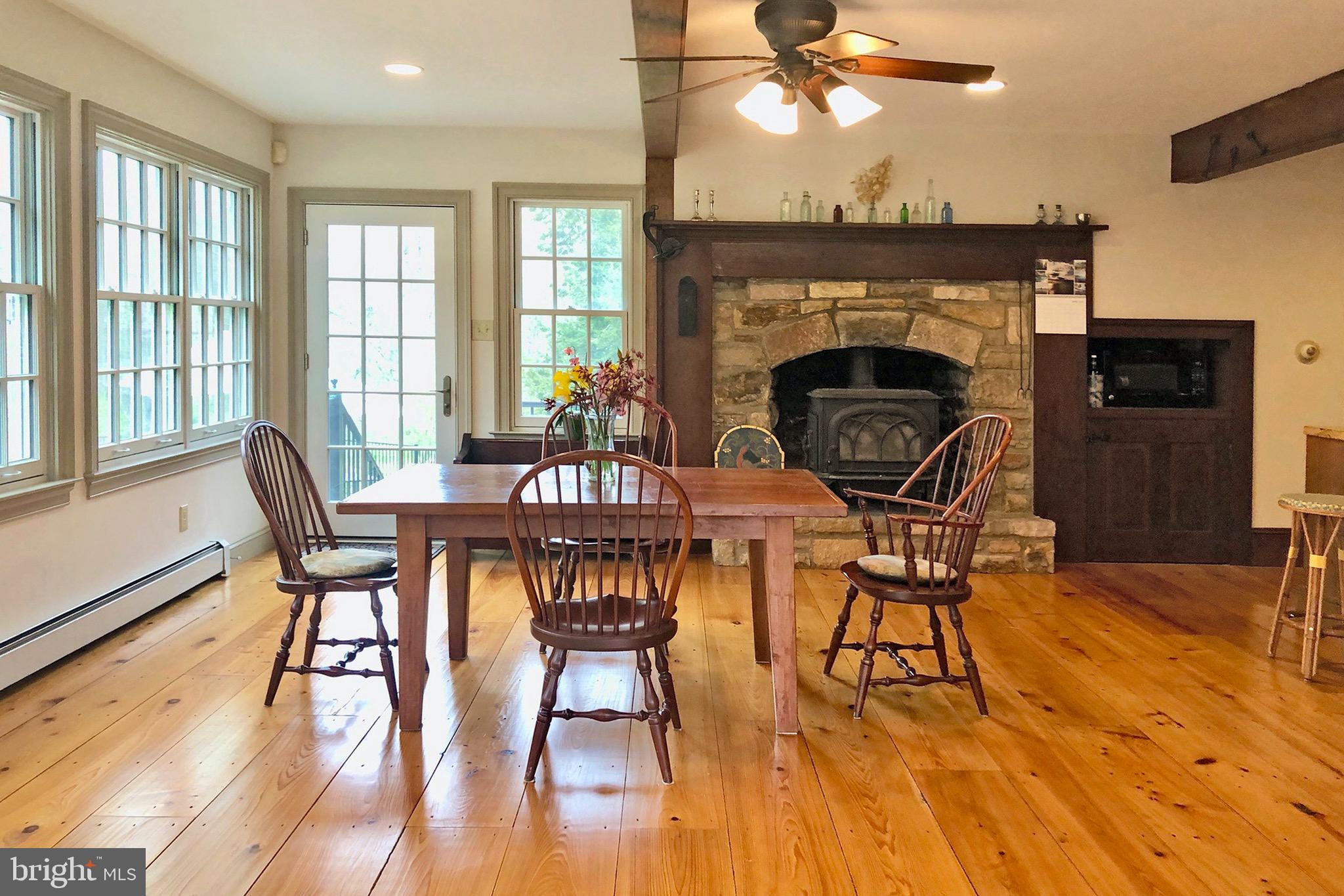 76 Pine Valley Road Doylestown, PA 18901 - Photo 9 of 39 Kitchen has stone fireplace