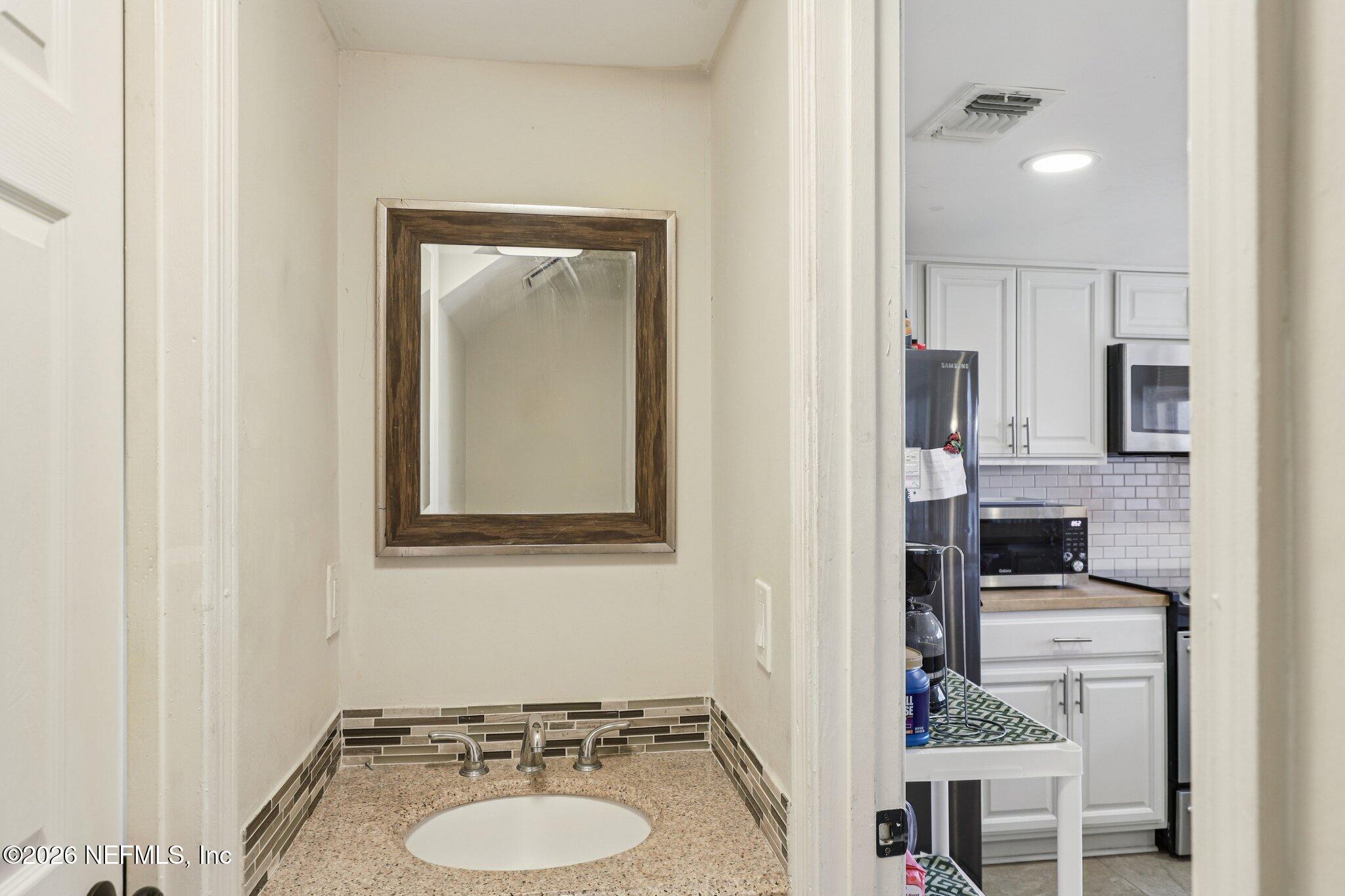 3517 Peeler Road, Unit 13 Jacksonville, FL 32277 - Photo 16 of 33 Half Bath