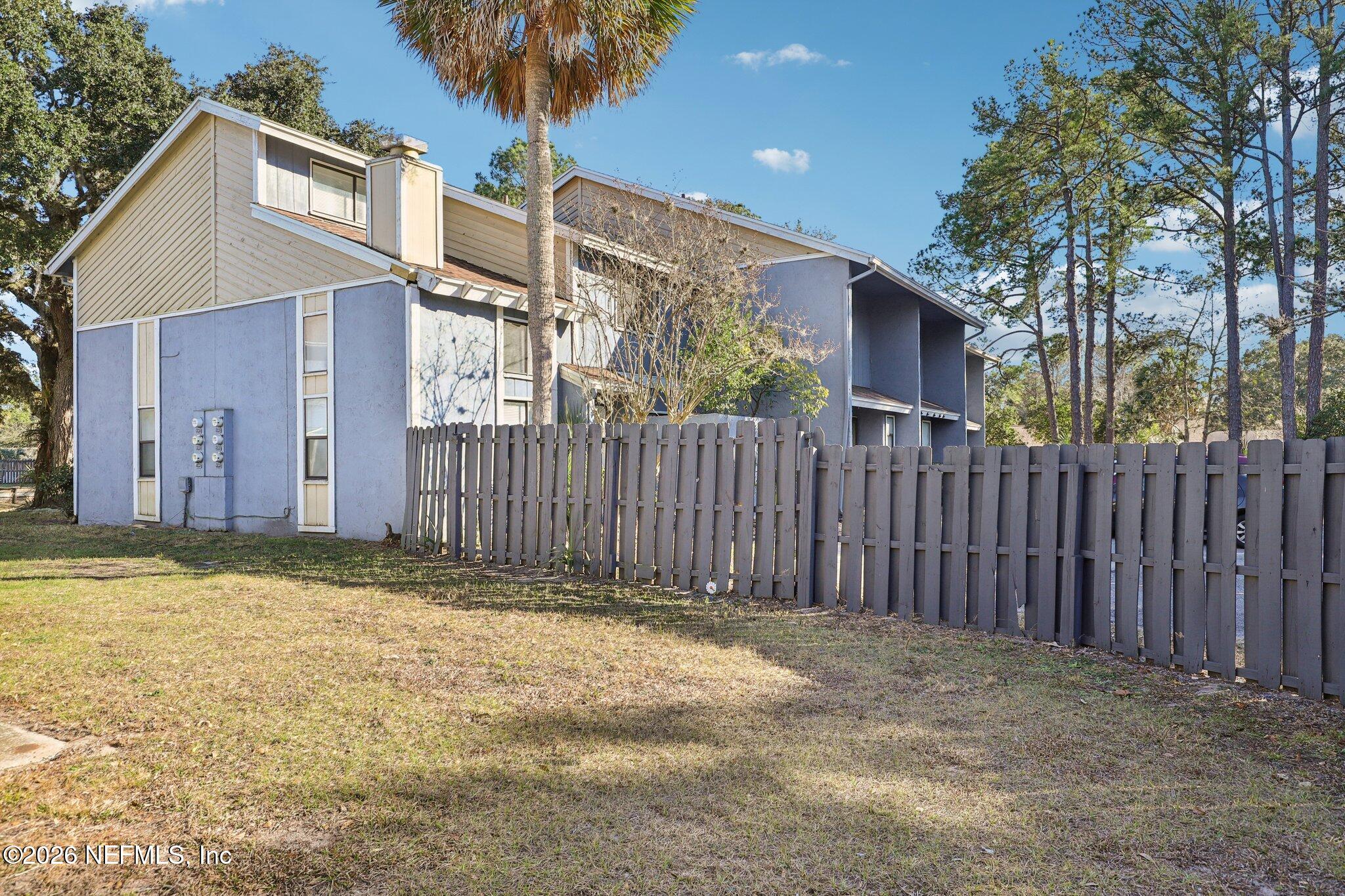 3517 Peeler Road, Unit 13 Jacksonville, FL 32277 - Photo 29 of 33 Side Yard