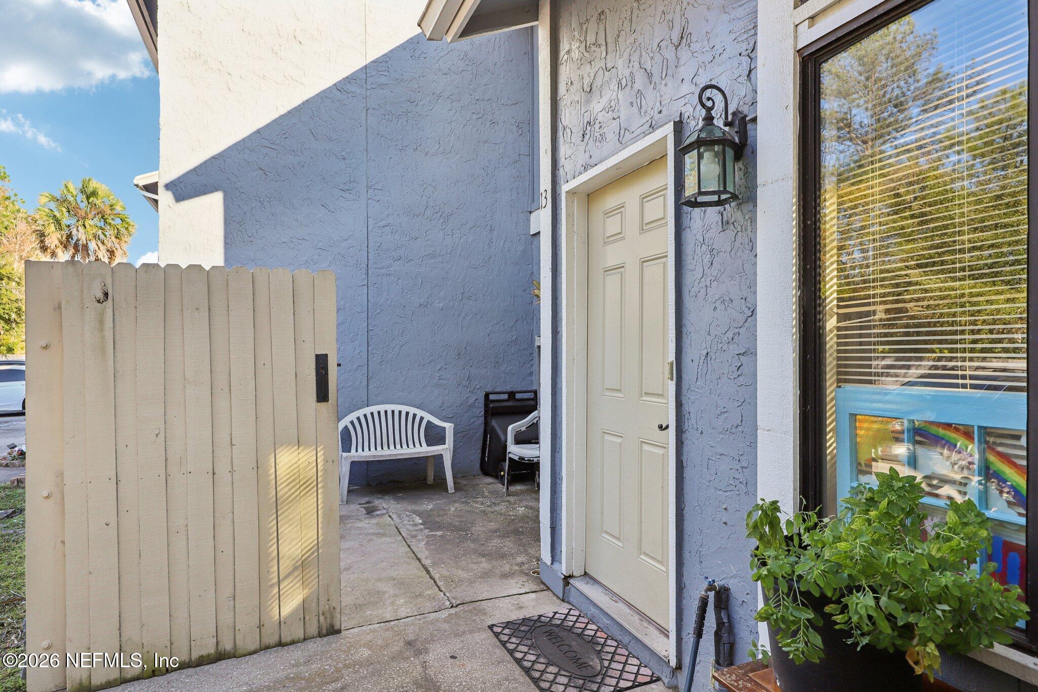 3517 Peeler Road, Unit 13 Jacksonville, FL 32277 - Photo 3 of 33 Front Patio
