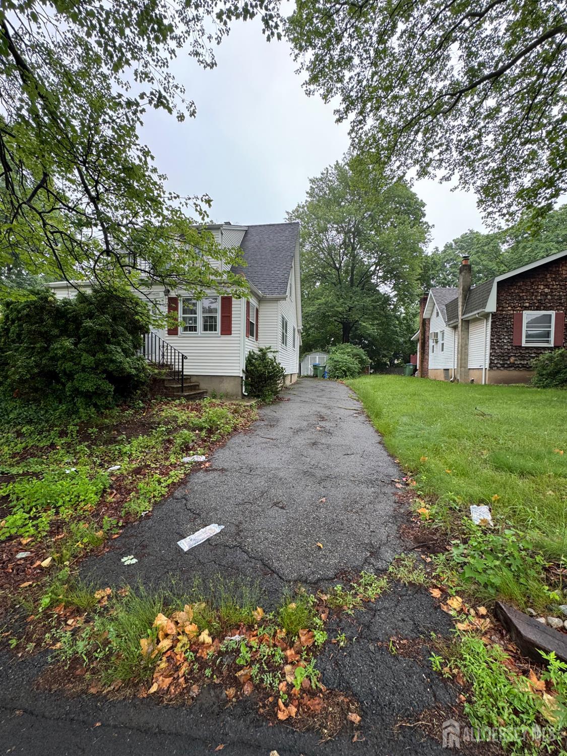 a house view with a garden space