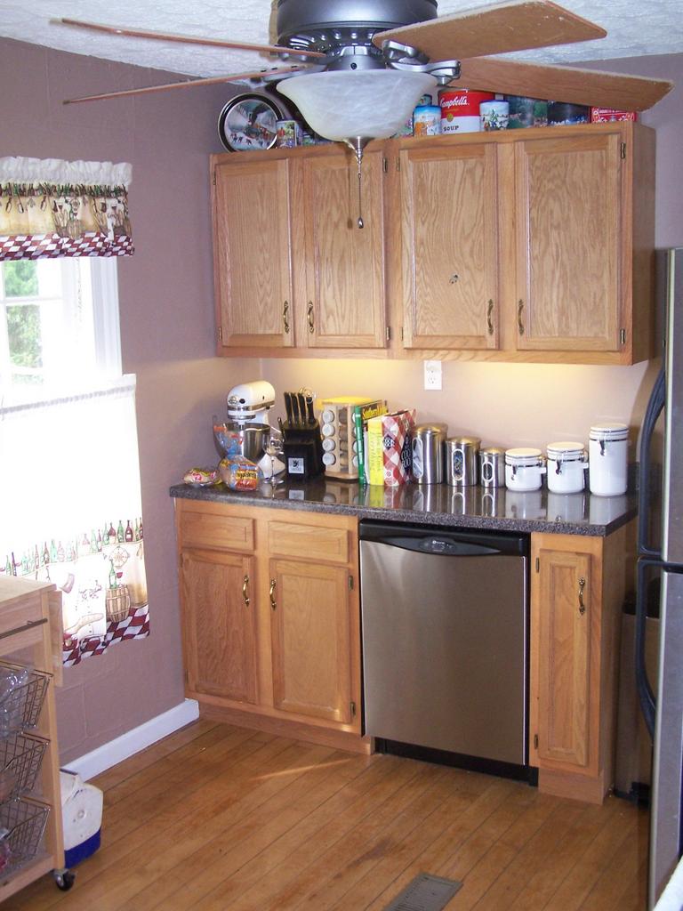 4725 Horseshoe Bend Road Goodview, VA 24095 - Photo 4 of 9 a kitchen with stainless steel appliances granite countertop a sink and cabinets