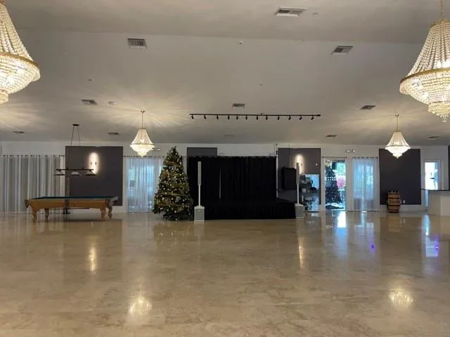 a view of a lobby with furniture and a fireplace