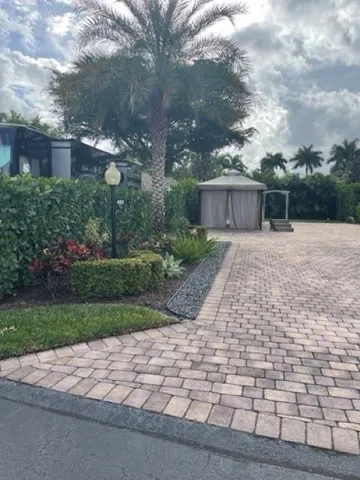 a backyard of a house with lots of green space