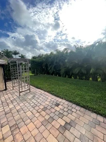 a view of a garden with a bench