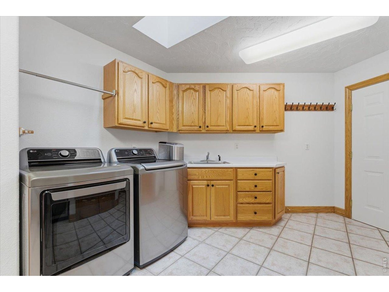 6239 Ashcroft Road Greeley, CO 80634 - Photo 23 of 45 Main Floor Laundry