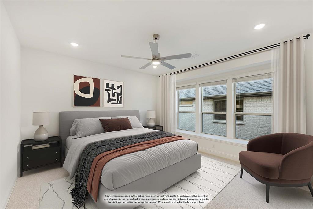 7308 Iris Road Aubrey, TX 76227 - Photo 20 of 40 a bedroom with a large bed and a couch