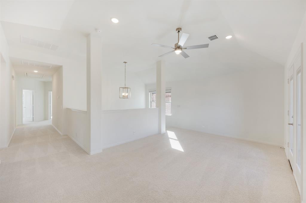 7308 Iris Road Aubrey, TX 76227 - Photo 26 of 40 wooden floor in an empty room