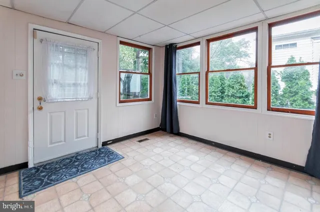 an empty room with windows